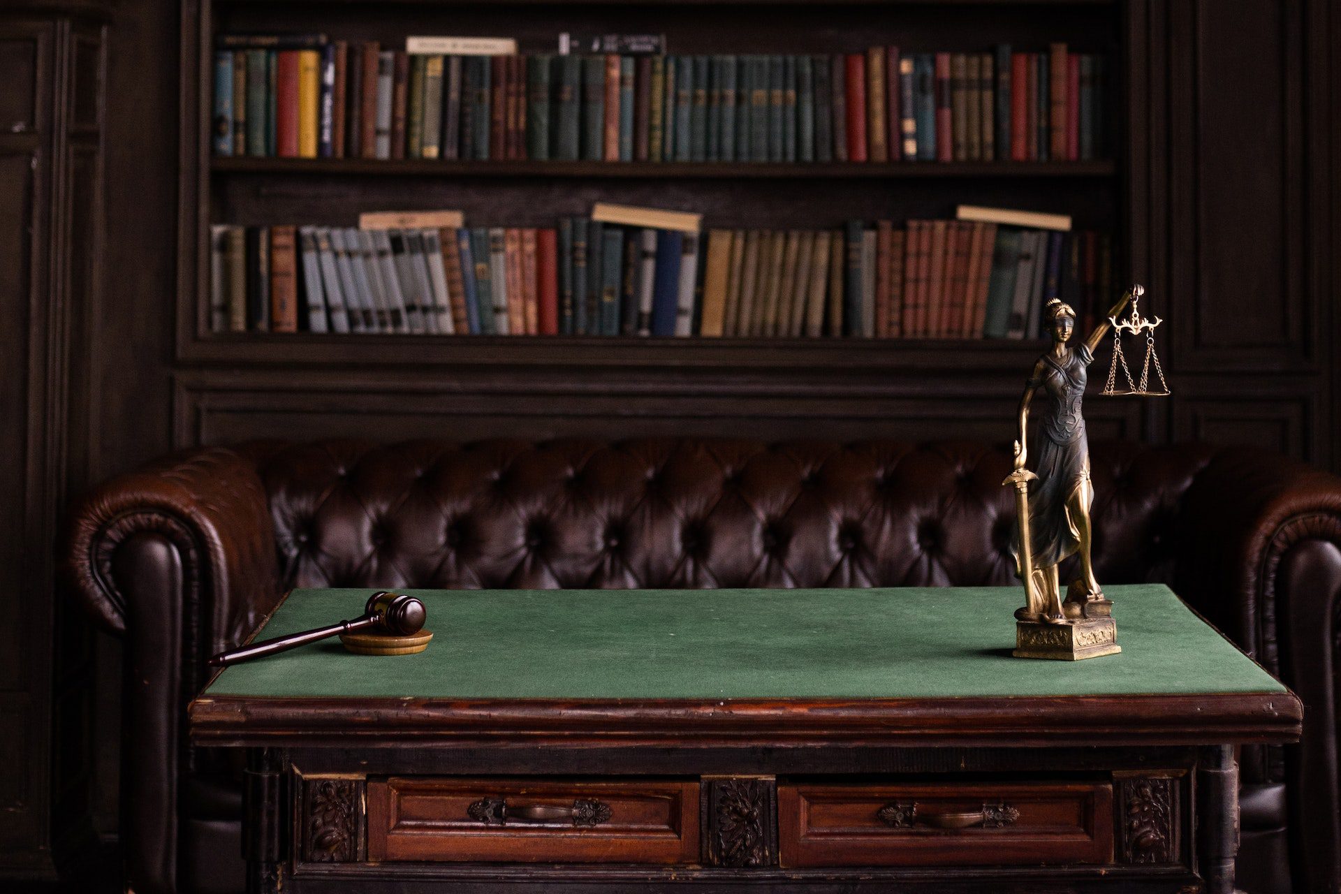 lady justice bookshelf couch